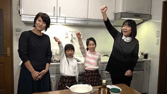 The Murakawas, a local family, help Maki cook.