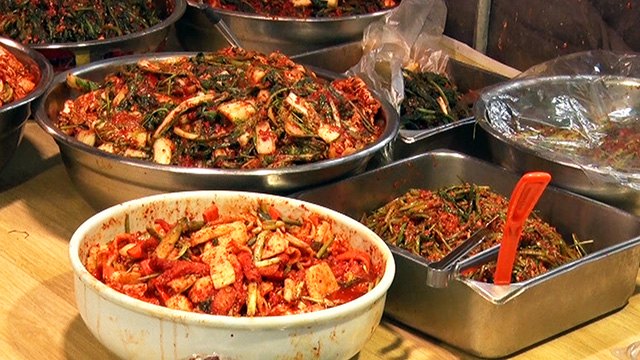 Kimchi and other traditional Korean side dishes are commonly sold.