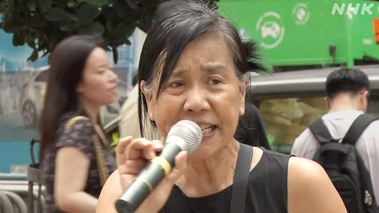 選挙で過半数目指すのがなぜ罪に？香港の街頭で訴える妻