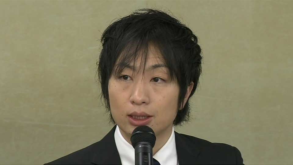 Komazaki at news conference