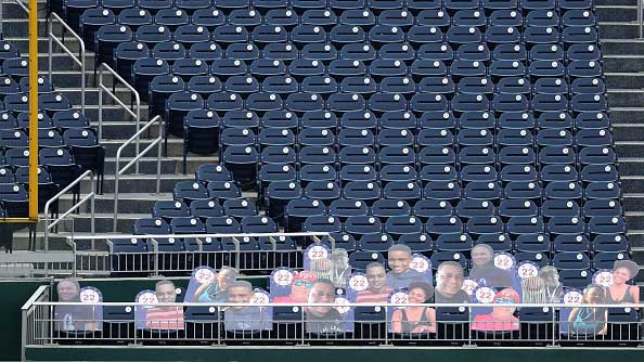 Baseball players in an empty ballpark