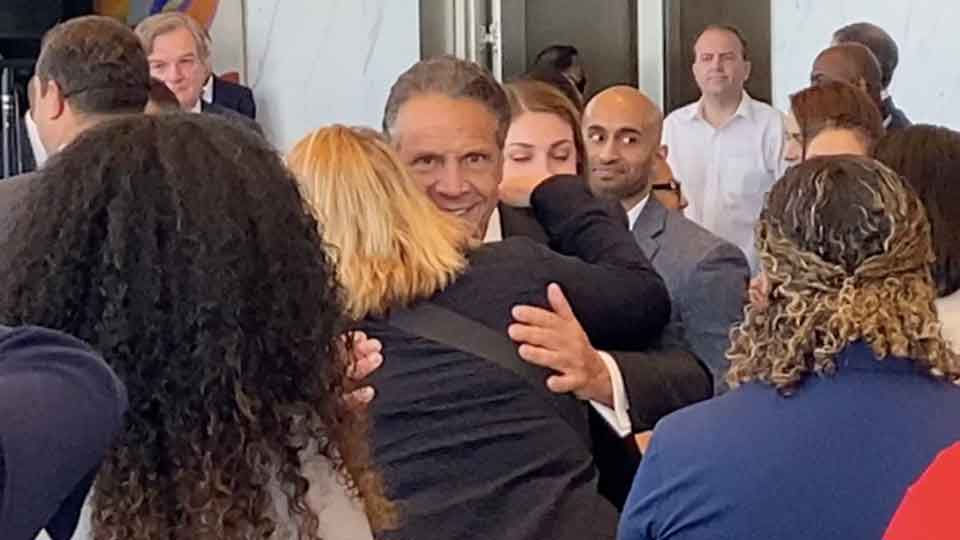 Former Gov. Cuomo hugs his supporters