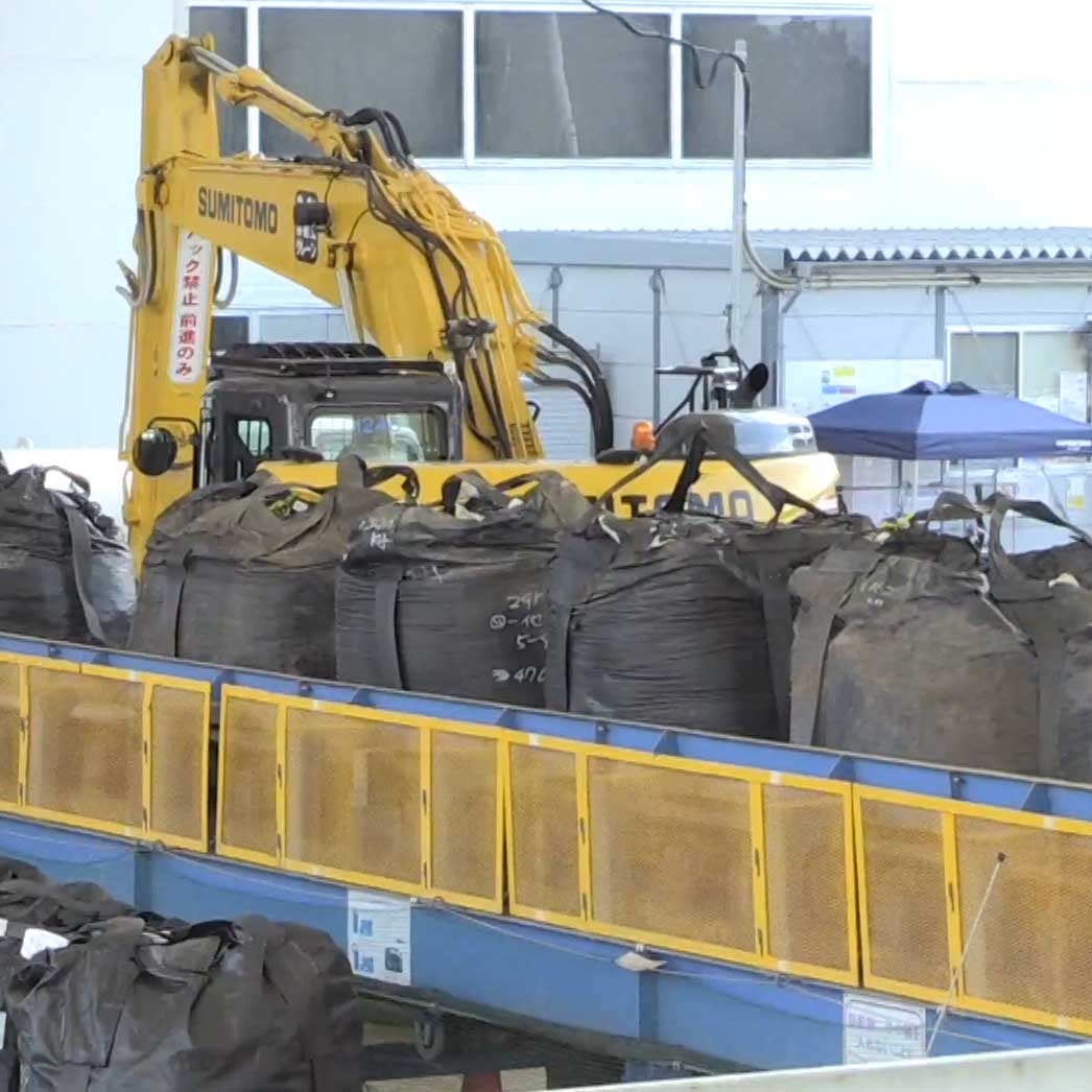 Contaminated soil piles up in vast Fukushima cleanup project