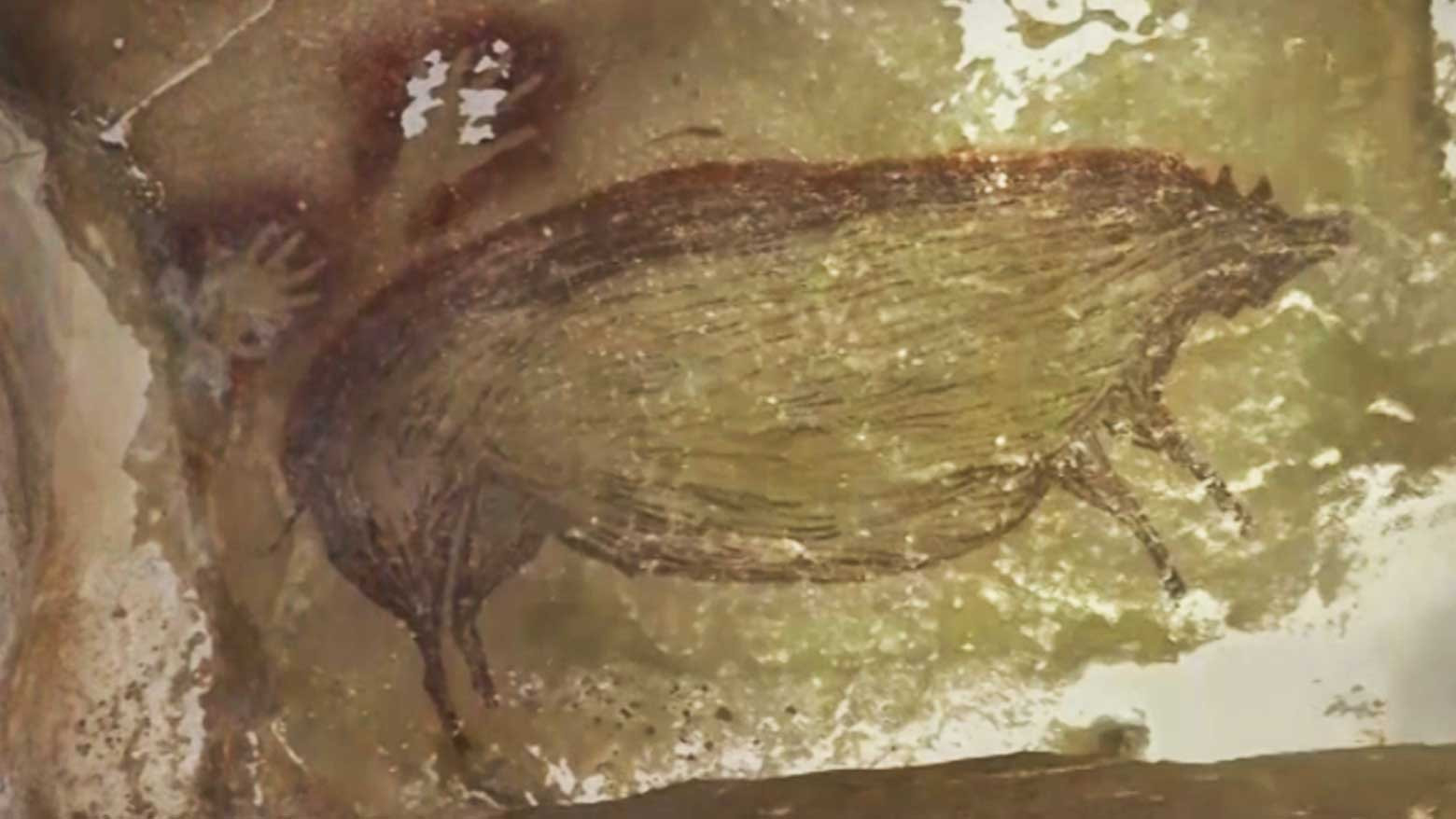 A journey to the world's oldest-known animal painting