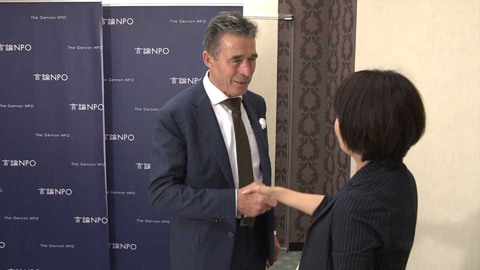 shaking hands with Rasmussen