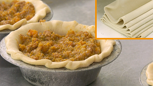 The pie dough is folded over repeatedly to achieve a light and flaky crust, which is then packed with a delicious beef gravy and filling. The most popular pie filling features ground beef, carrots, and all kinds of herbs and spices.