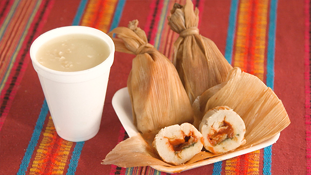 Chuchitos are a a traditional Guatemalan dish in which a dough made with maize is stuffed with meat and tomato sauce, wrapped in maize husks, and steamed. It's typically eaten with a creamy soup-like beverage also made with maize.