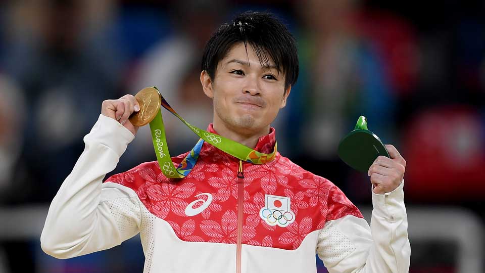 Uchimura is awarded a gold medal at the Rio Olympics